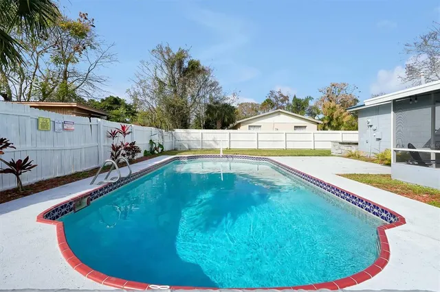 a view of a house with swimming pool