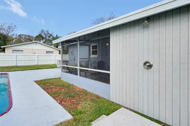 a view of front door and yard