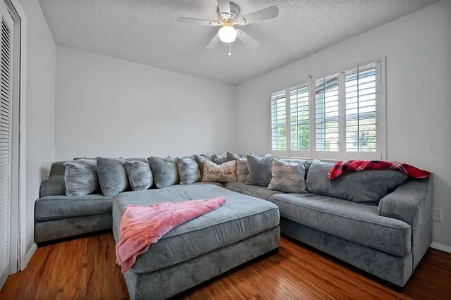 a living room with furniture and a window