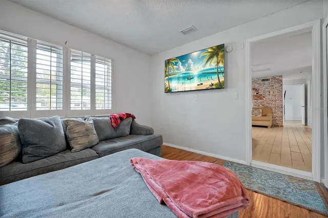 a living room with furniture and a window