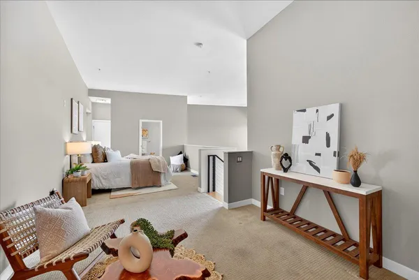 a bedroom with a bed and a night lamp