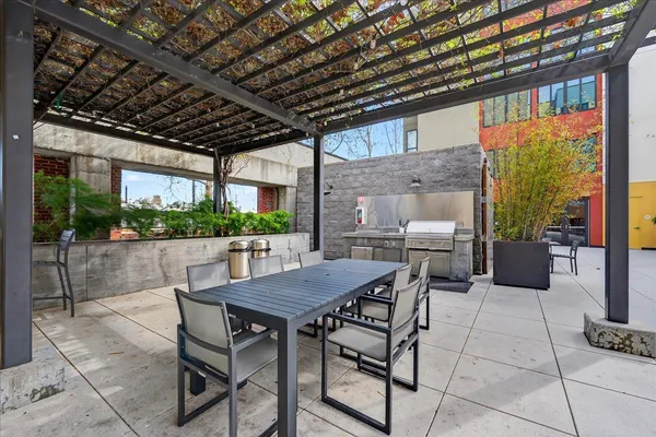 a view of a kitchen with a sink and a stove