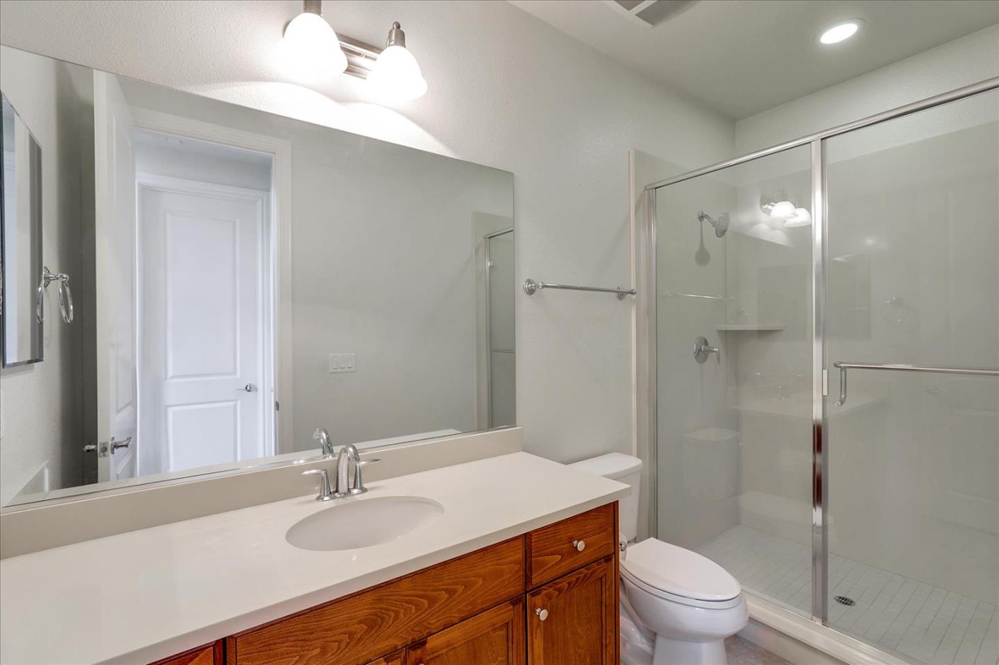1345 Bayberry View Lane San Ramon, CA 94582 - Photo 41 of 65 a bathroom with a sink toilet vanity and shower
