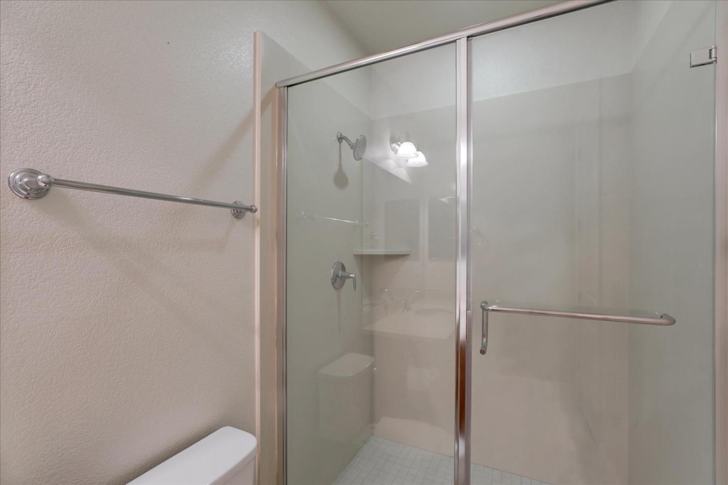 1345 Bayberry View Lane San Ramon, CA 94582 - Photo 42 of 65 a bathroom that has a glass shower door