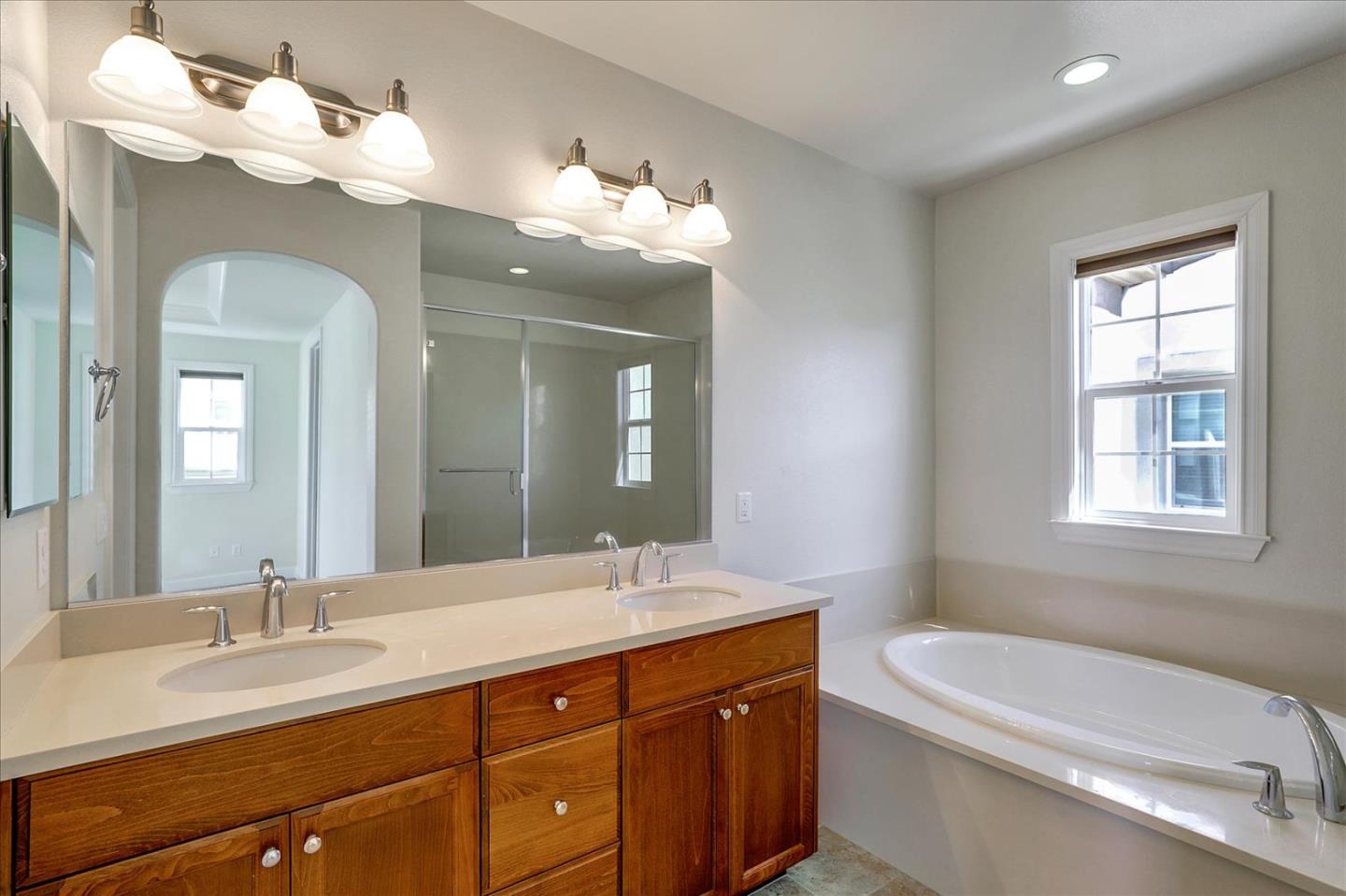 1345 Bayberry View Lane San Ramon, CA 94582 - Photo 44 of 65 a bathroom with a double vanity sink and a mirror