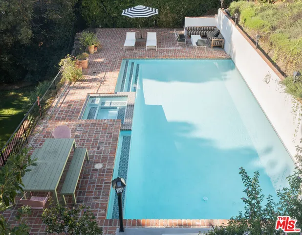 a view of a balcony with chairs