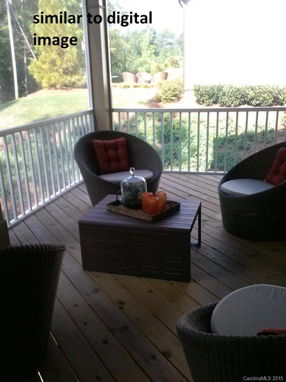 300 Helton Lane, Unit 7 Fort Mill, SC 29708 - Photo 8 of 8 a living room with furniture and a floor to ceiling window