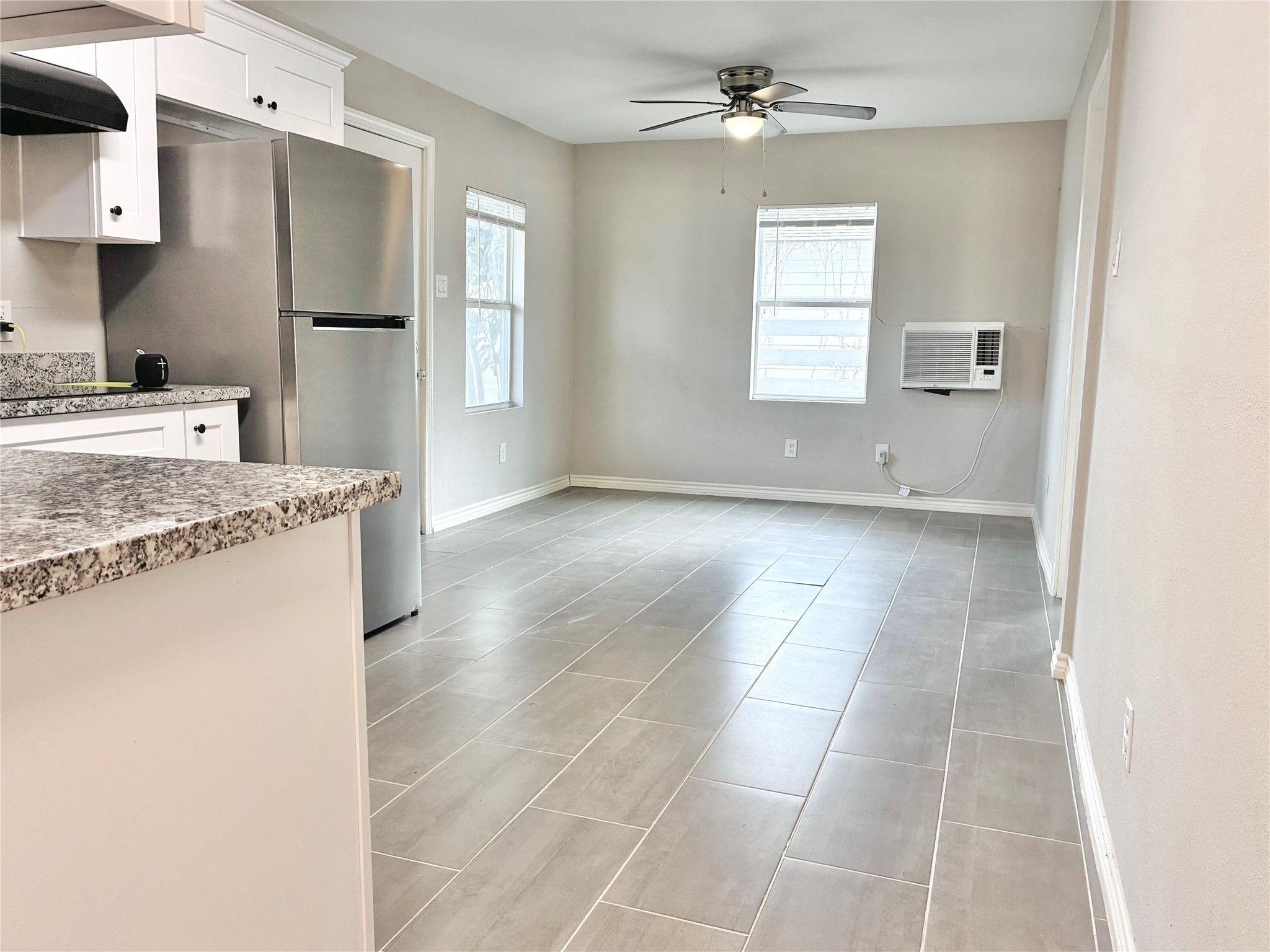 2220 Avenue L, Unit 110 Rosenberg, TX 77471 - Photo 6 of 10 A view of the kitchen; opens up to the dining/living space