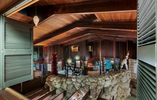 a view of people sitting in back of a room