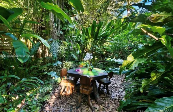 a view of a table and chairs in patio