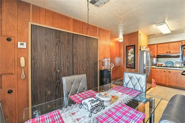 a bedroom with a bed and a table