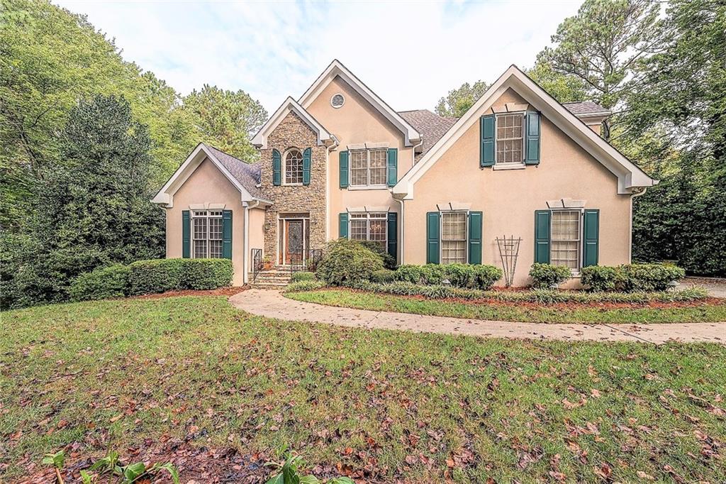 2683 Francis Road Milton, GA 30004 - Photo 1 of 1 Exclusive home with lovely natural and golf-view setting in coveted Champions View community. Desirable floorplan with master on main, amazing sunroom and fabulous finished basement