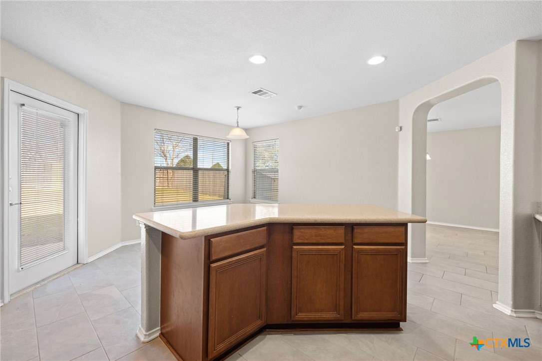 8420 Starview Street Temple, TX 76502 - Photo 12 of 36 a kitchen with a sink and cabinets