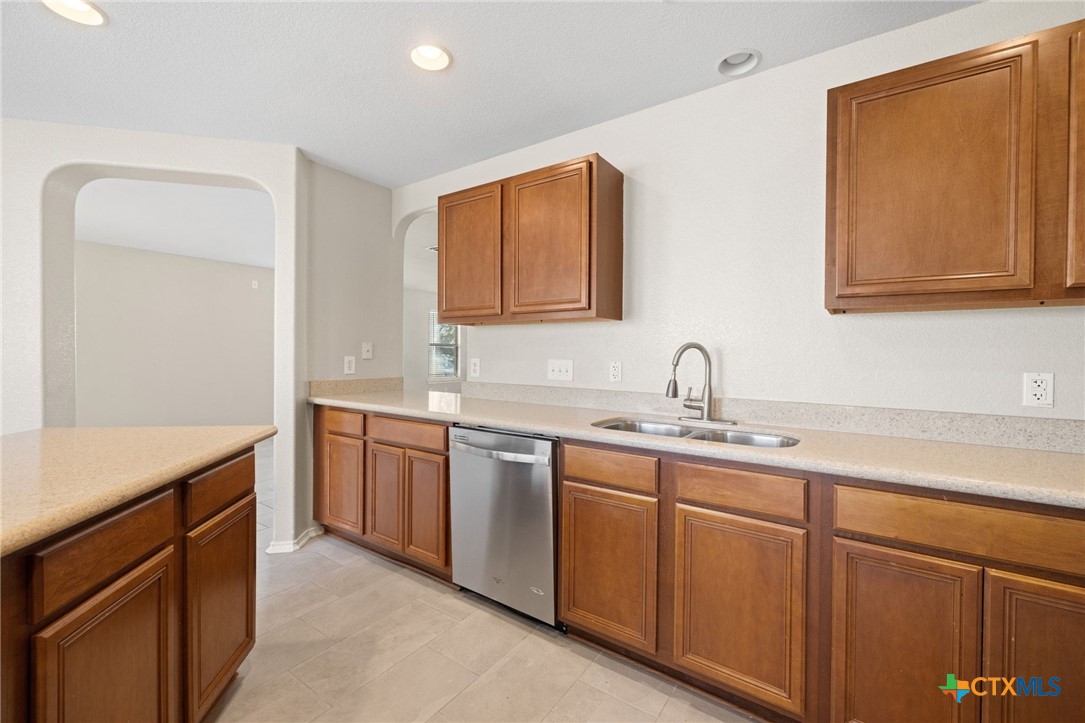 8420 Starview Street Temple, TX 76502 - Photo 14 of 36 a kitchen with sink and cabinets