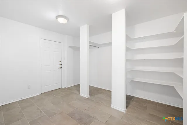 a view of an empty room with an empty room