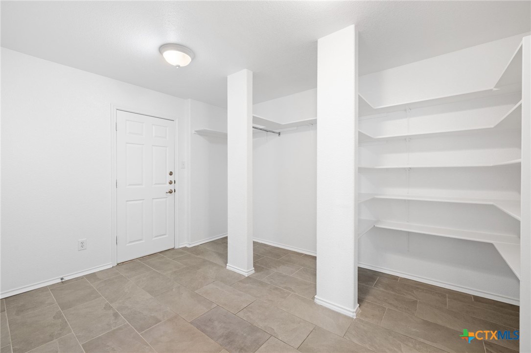 8420 Starview Street Temple, TX 76502 - Photo 18 of 36 a view of an empty room with an empty room