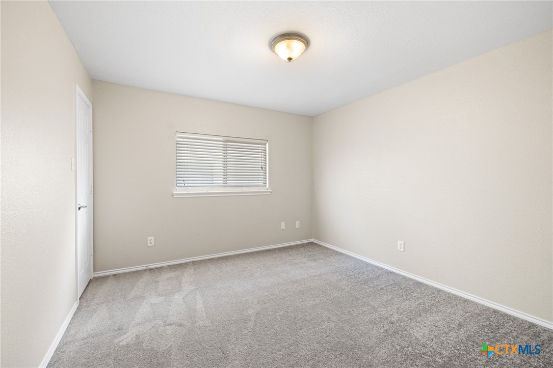 8420 Starview Street Temple, TX 76502 - Photo 25 of 36 a view of an empty room with a window