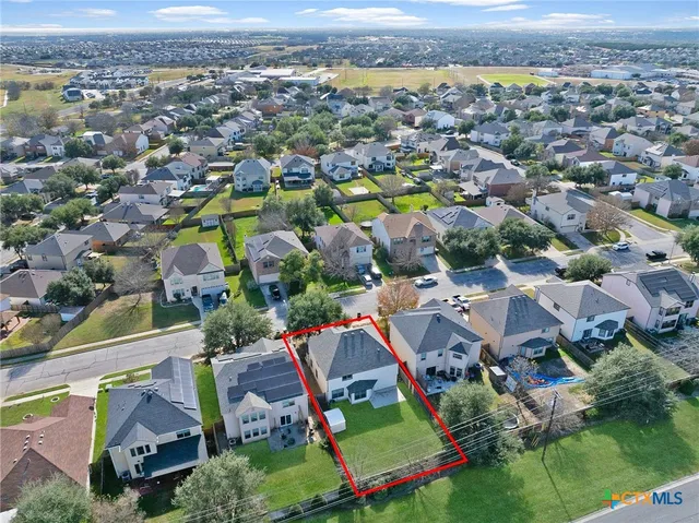 an aerial view of multiple house
