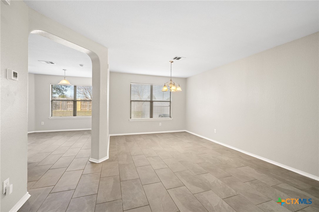 8420 Starview Street Temple, TX 76502 - Photo 9 of 36 a view of an empty room with a window