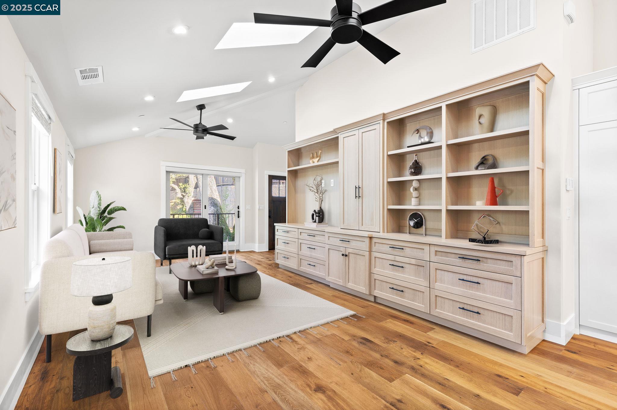 100 B Moraga Way Orinda, CA 94563 - Photo 15 of 48 a living room with furniture cabinets and a wooden floor