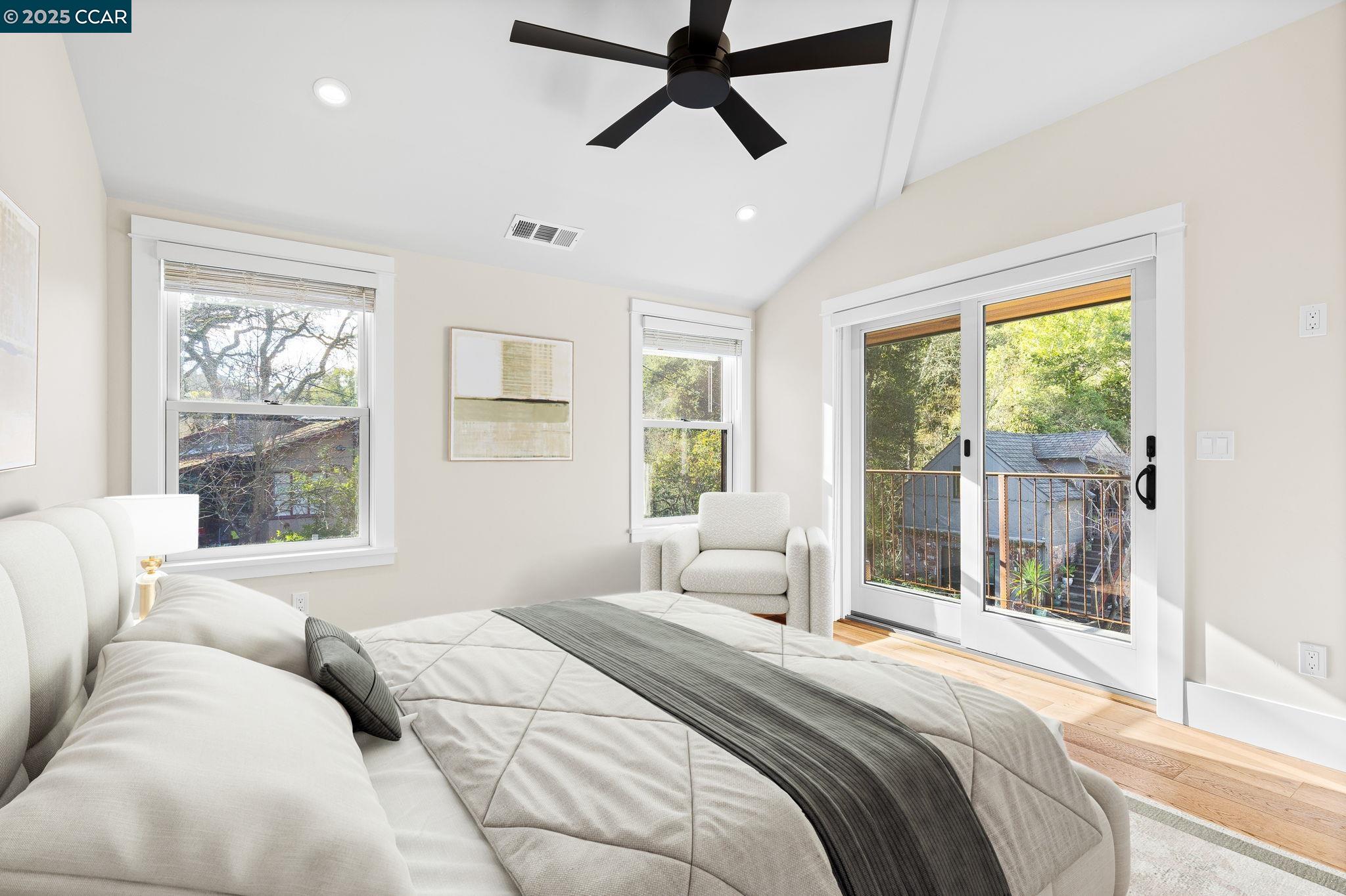 100 B Moraga Way Orinda, CA 94563 - Photo 17 of 48 a bedroom with a large bed and a window