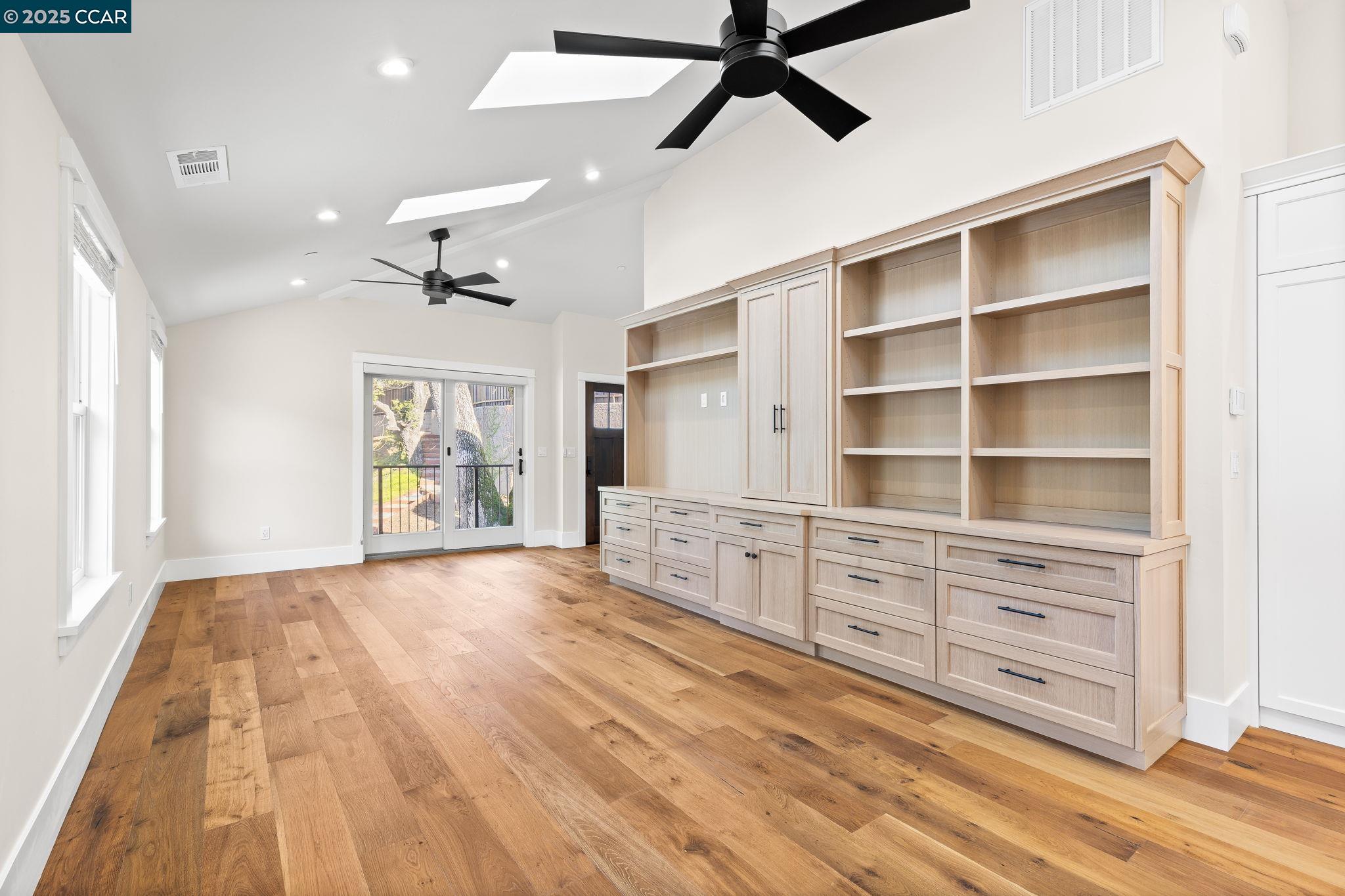 100 B Moraga Way Orinda, CA 94563 - Photo 24 of 48 a view of an empty room with window and wooden floor