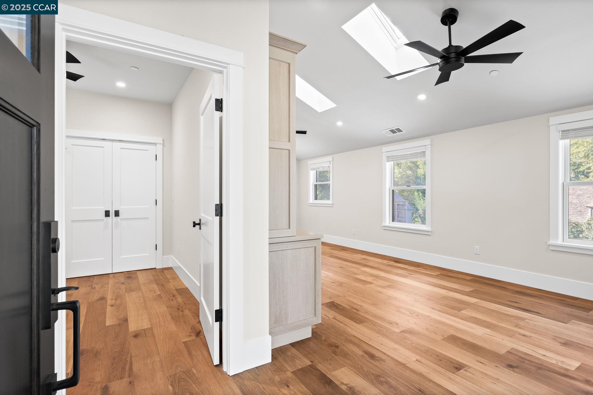 100 B Moraga Way Orinda, CA 94563 - Photo 35 of 48 a view of empty room with wooden floor and fan