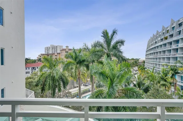 a view of a tall building from a window