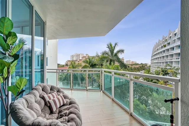 a balcony with furniture