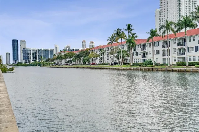 a view of a lake with building in front of it
