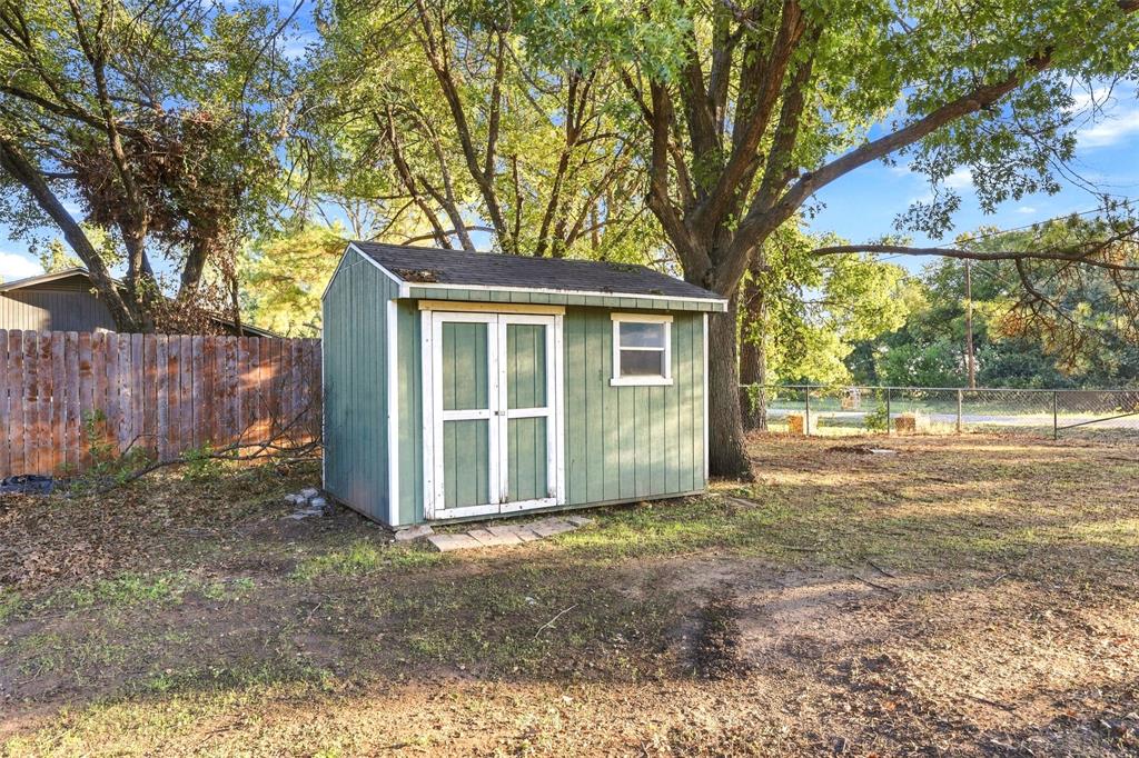 304 Sage Trail Springtown, TX 76082 - Photo 29 of 33 Storage Shed – Detached 12x8 shed with double doors provides additional storage space.