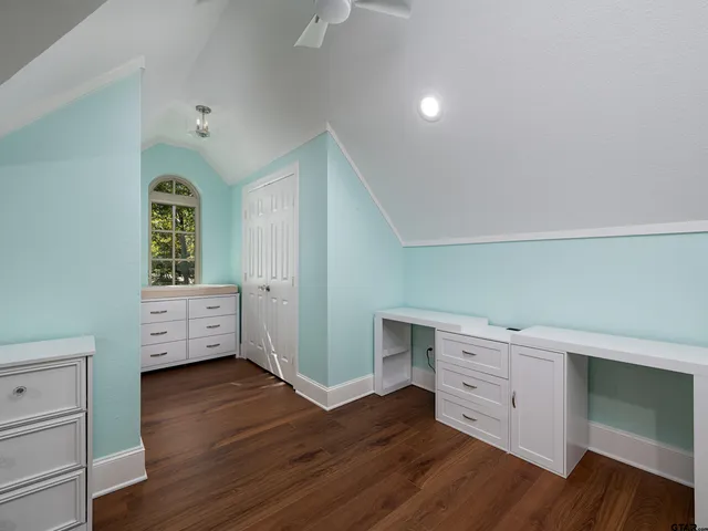 a view of a livingroom with furniture and wooden floor