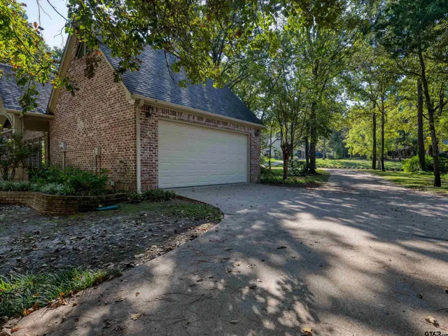a view of a house with a tree