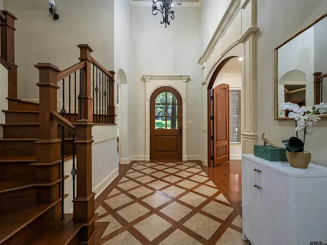 a view of entryway with a front door