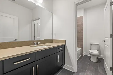 a bathroom with a sink and a toilet