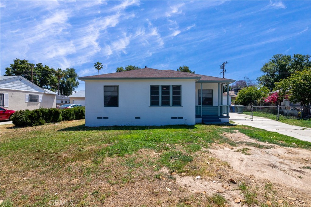 4416 Kansas Avenue Riverside, CA 92507 - Photo 1 of 1 a view of a house with backyard and garden