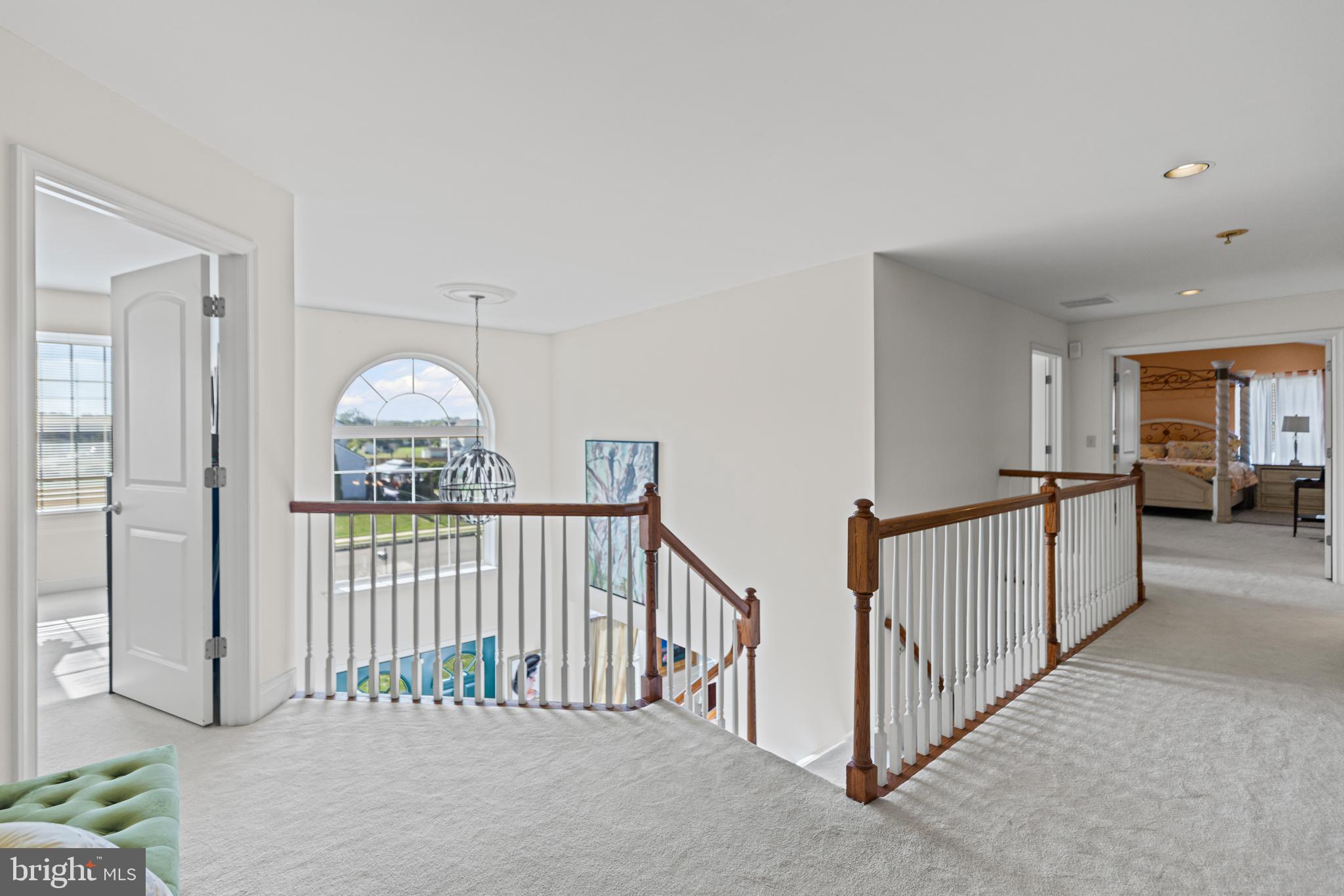 1 Cardinal Lane Sicklerville, NJ 08081 - Photo 21 of 35 a view of a hallway with dining room and stairs