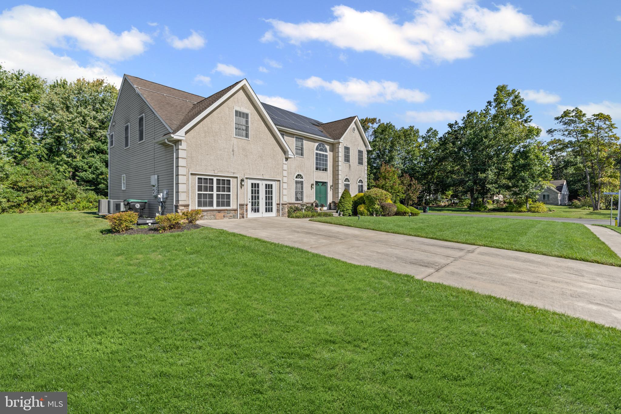 1 Cardinal Lane Sicklerville, NJ 08081 - Photo 3 of 35 a front view of a house with a yard and trees