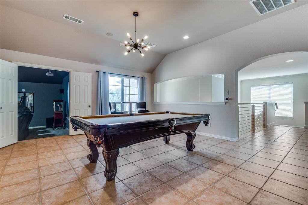 3313 Madison Avenue Hurst, TX 76054 - Photo 7 of 36 Gameroom featuring lofted ceiling, light tile patterned floors, and pool table