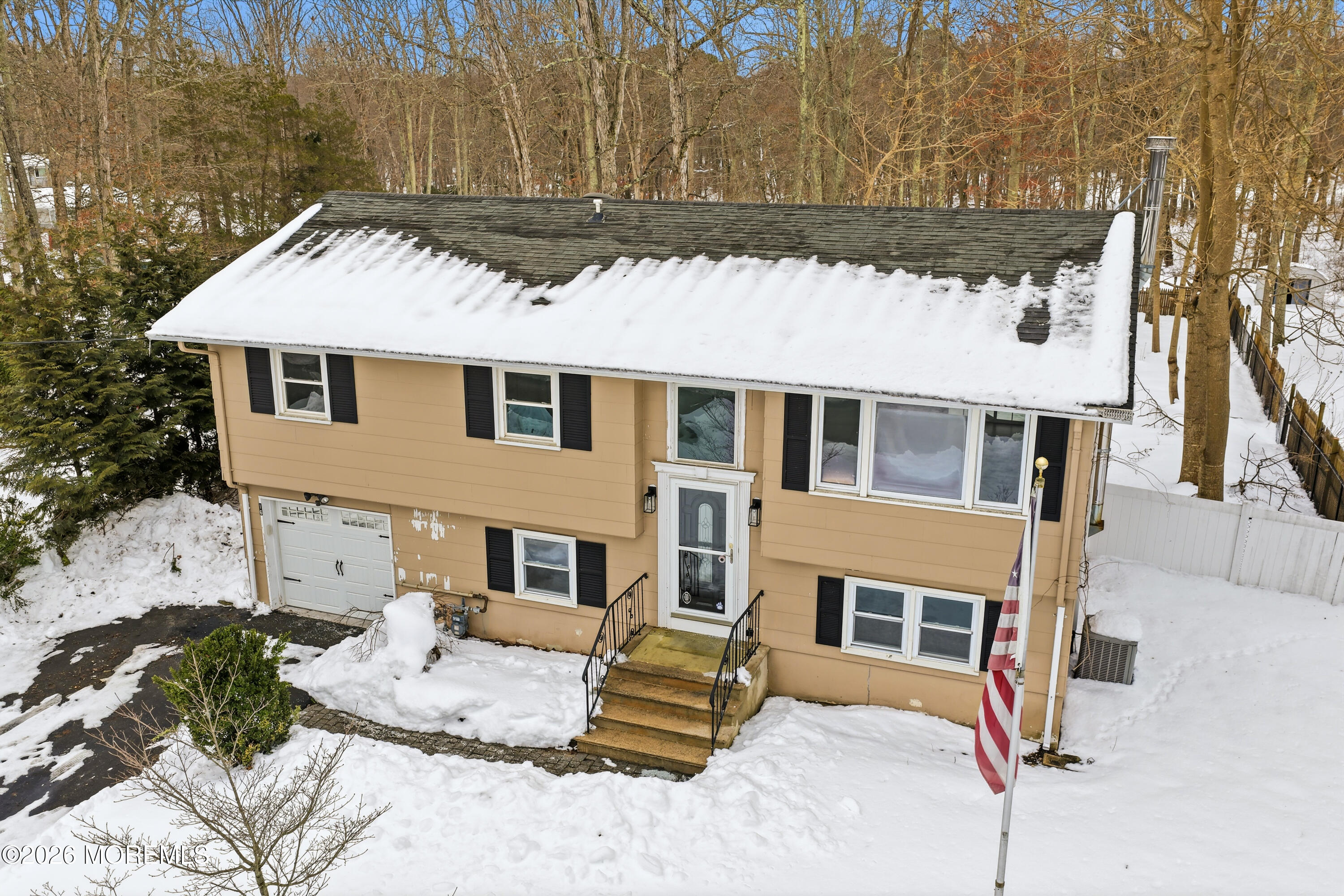 16 Crest Road Jackson, NJ 08527 - Photo 12 of 56 a front view of a house with a yard