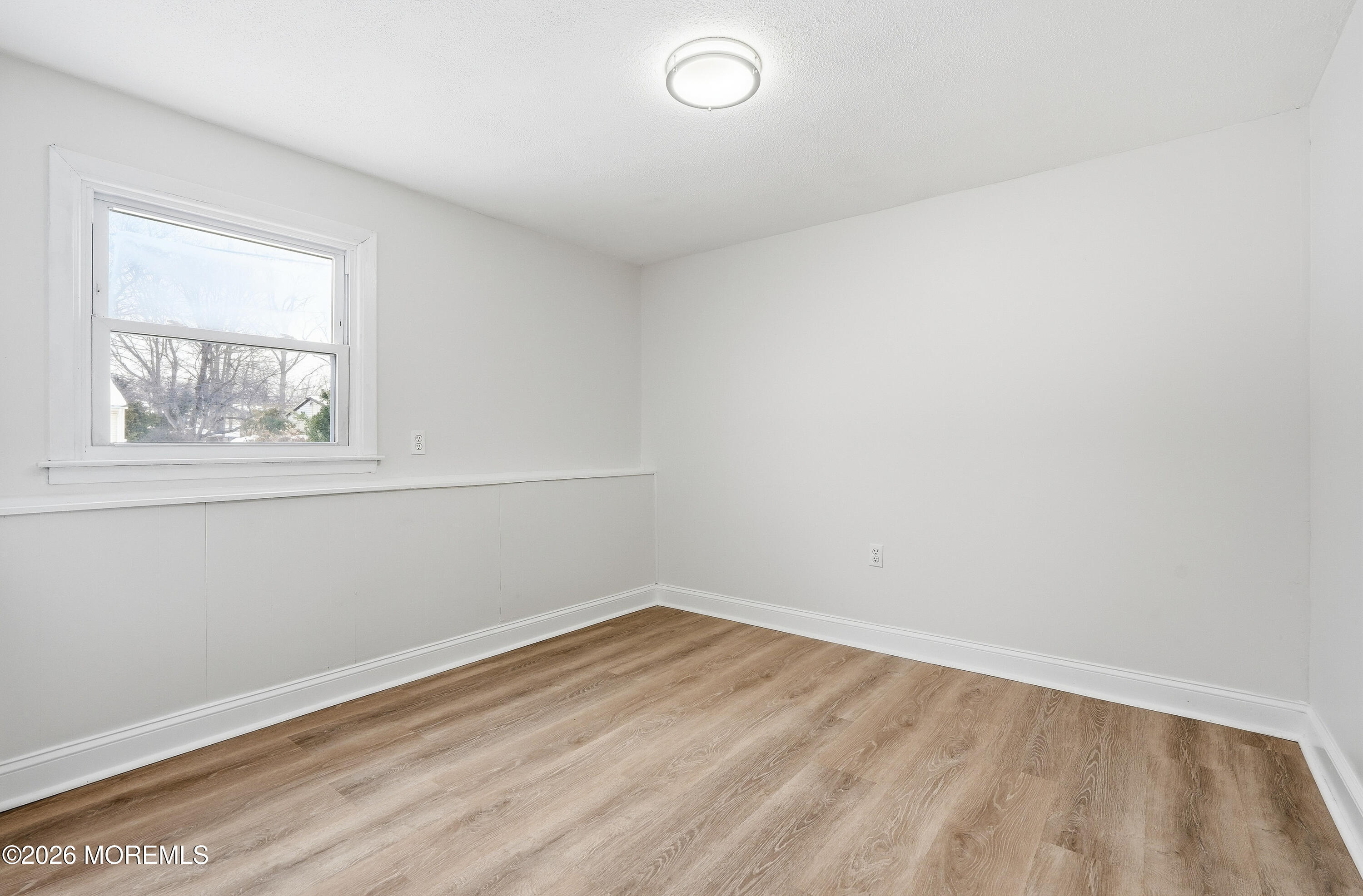16 Crest Road Jackson, NJ 08527 - Photo 2 of 56 an empty room with a window