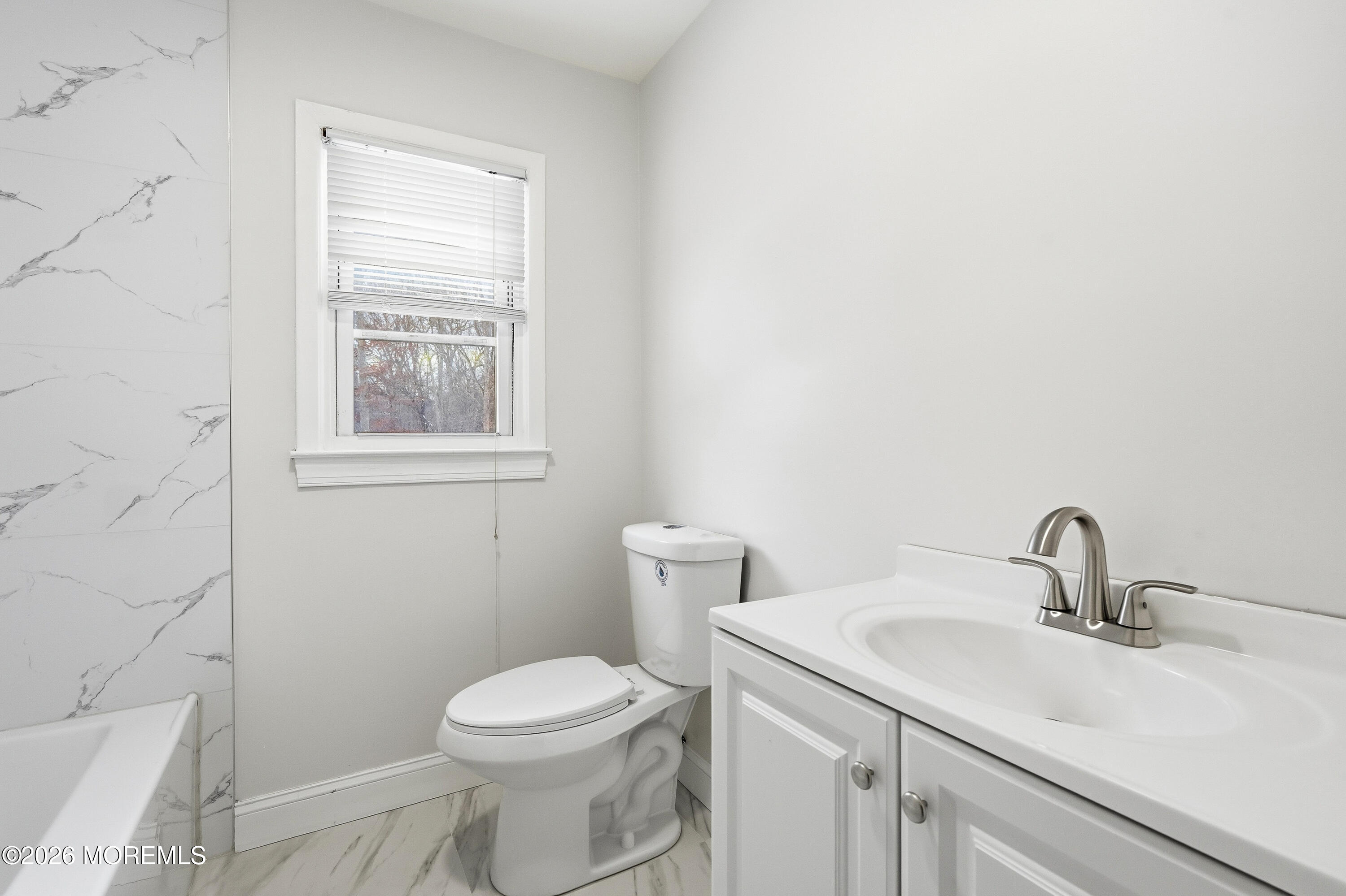 16 Crest Road Jackson, NJ 08527 - Photo 29 of 56 a bathroom with a sink toilet and a mirror