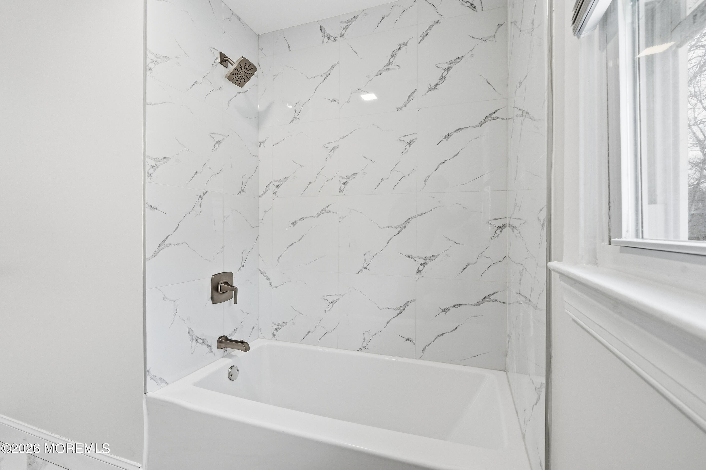 16 Crest Road Jackson, NJ 08527 - Photo 31 of 56 a bathroom with a bathtub