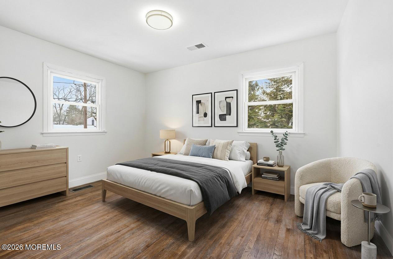 16 Crest Road Jackson, NJ 08527 - Photo 34 of 56 a bedroom with a bed and a window