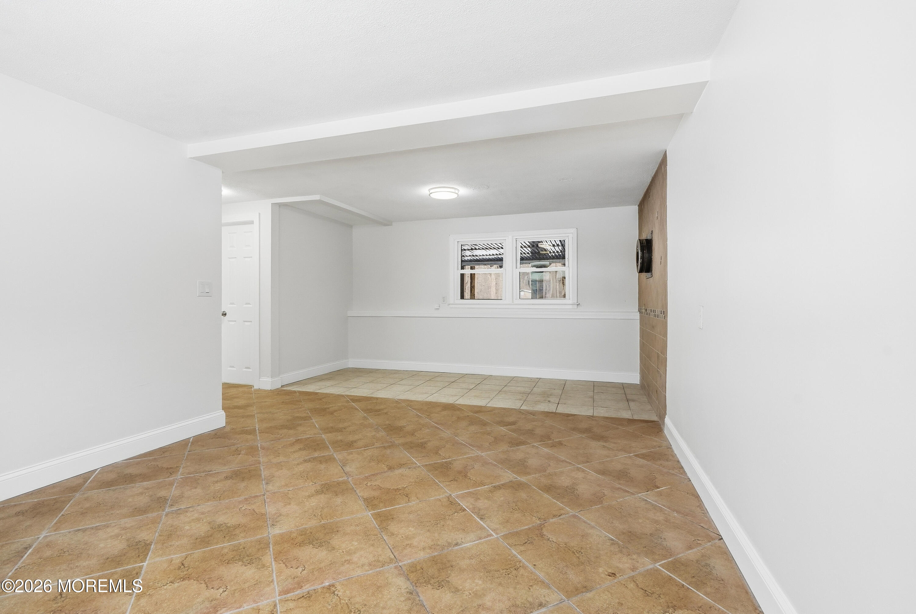 16 Crest Road Jackson, NJ 08527 - Photo 37 of 56 a view of an empty room and window