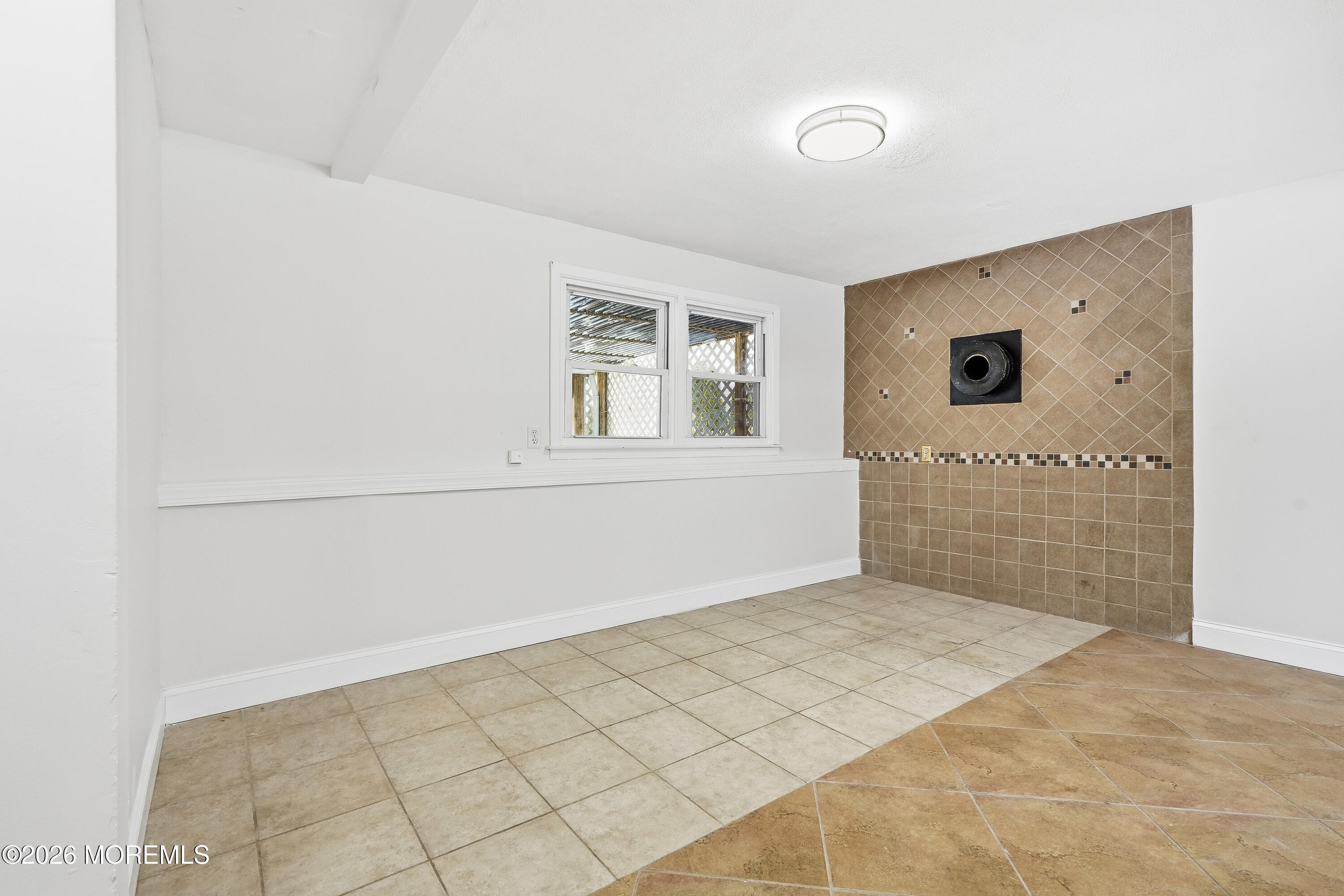 16 Crest Road Jackson, NJ 08527 - Photo 38 of 56 a view of an empty room