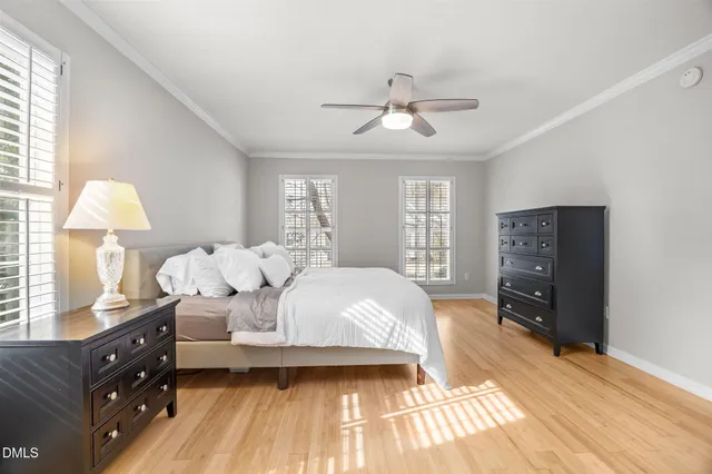 a view of a dining room with furniture and a wooden floor