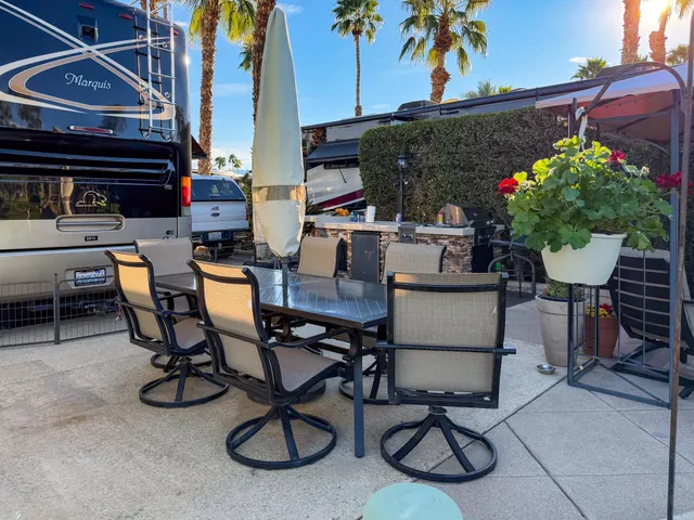 a outdoor living space with furniture and a couch