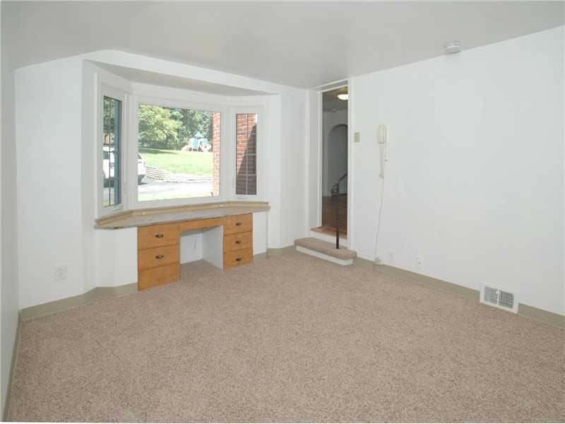 256 Duff Road Penn Hills, PA 15235 - Photo 3 of 10 Bedroom. First floor bedroom with bay window and full bath could be used as a master bedroom.Carpet is new