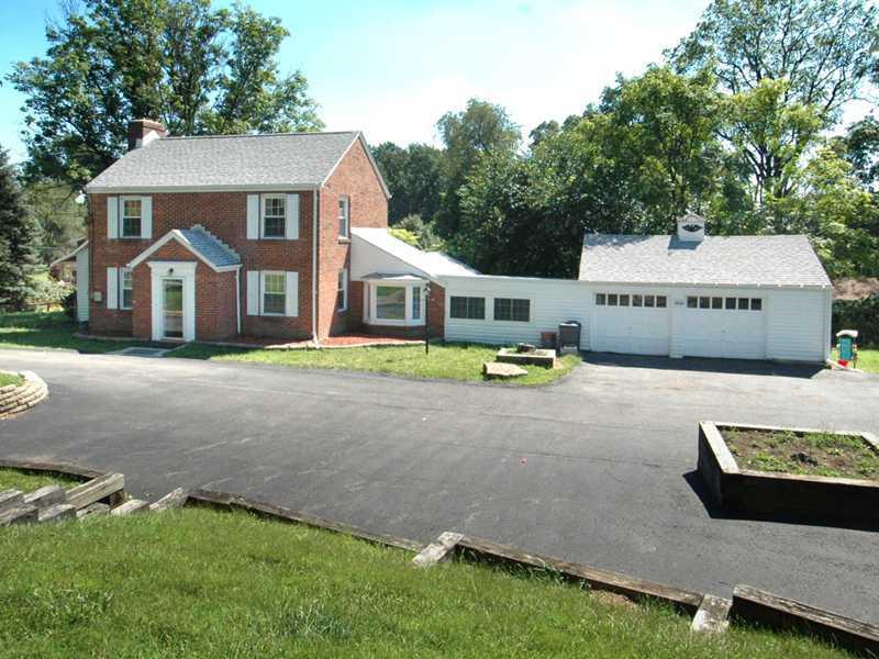 256 Duff Road Penn Hills, PA 15235 - Photo 10 of 10 Exterior Front. Paved driveway with huge parking area